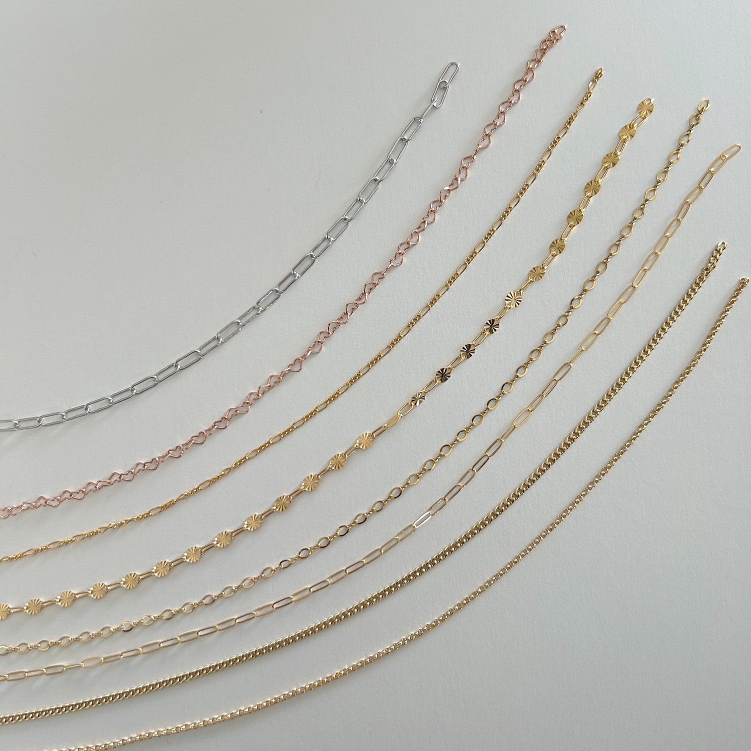 image of chains on a white table