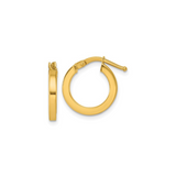 product image of two gold hoop earrings against a white backdrop