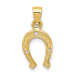 Gold horseshoe pendant on a white background