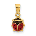 Gold pendant shaped like a ladybug on a white background