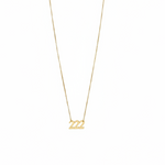 Gold necklace with '222' pendant on a white background