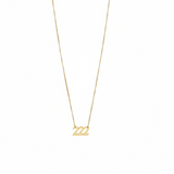 Gold necklace with '222' pendant on a white background