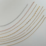 image of chains on a white table