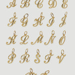 Gold letter pendants on a white background
